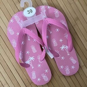 Pink latex flip flops from Germany
